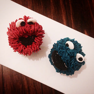 Elmo and Cookie Monster Cupcakes