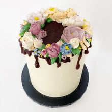 Load image into Gallery viewer, Colourful piped buttercream flowers. Perfect edible gifting idea for your special person. Order your birthday cake now. Delivery is available in and around London.
